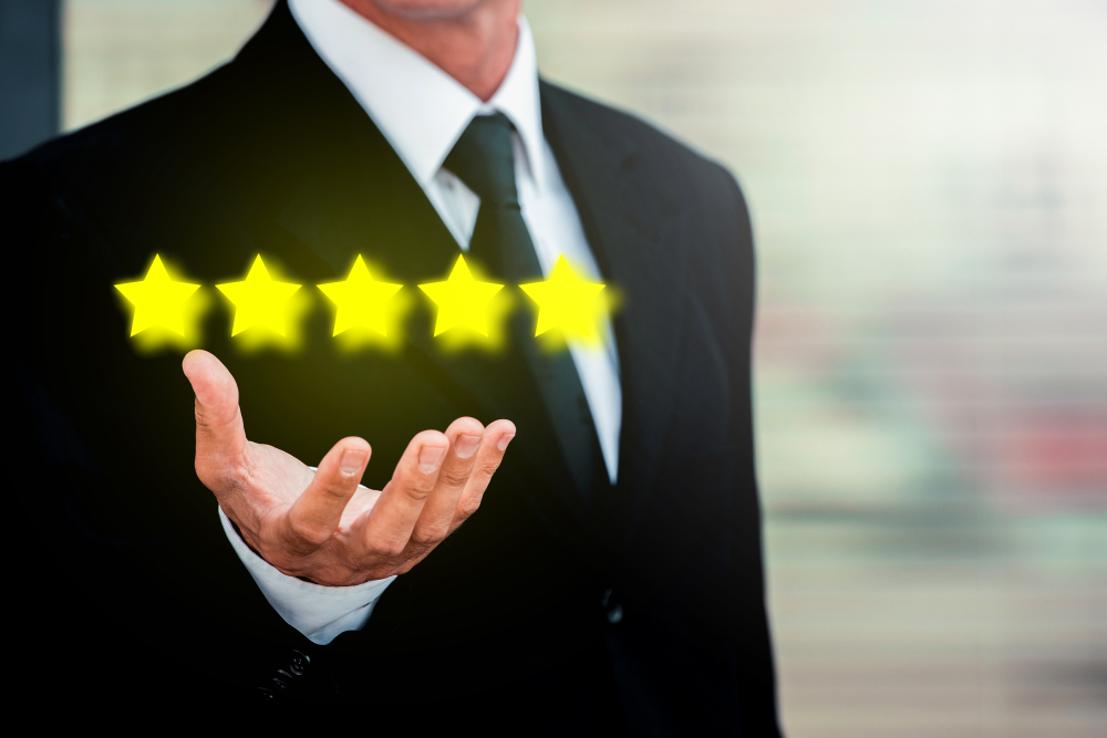 Hand holding 5-star feedback rating for excellent service delivery